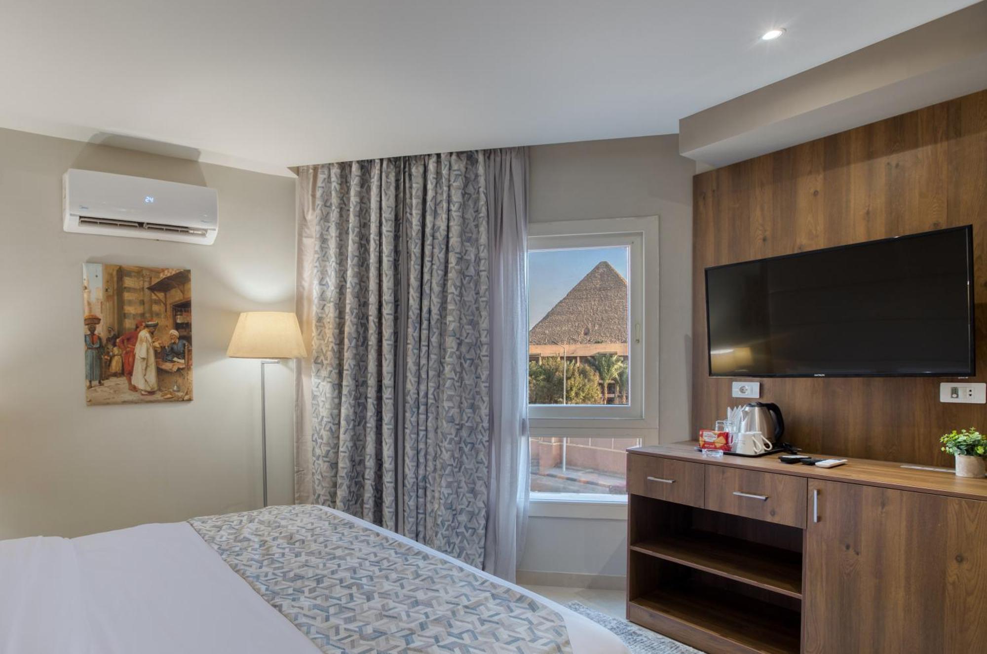 Double Room Pyramids View,1547949664:JPEG