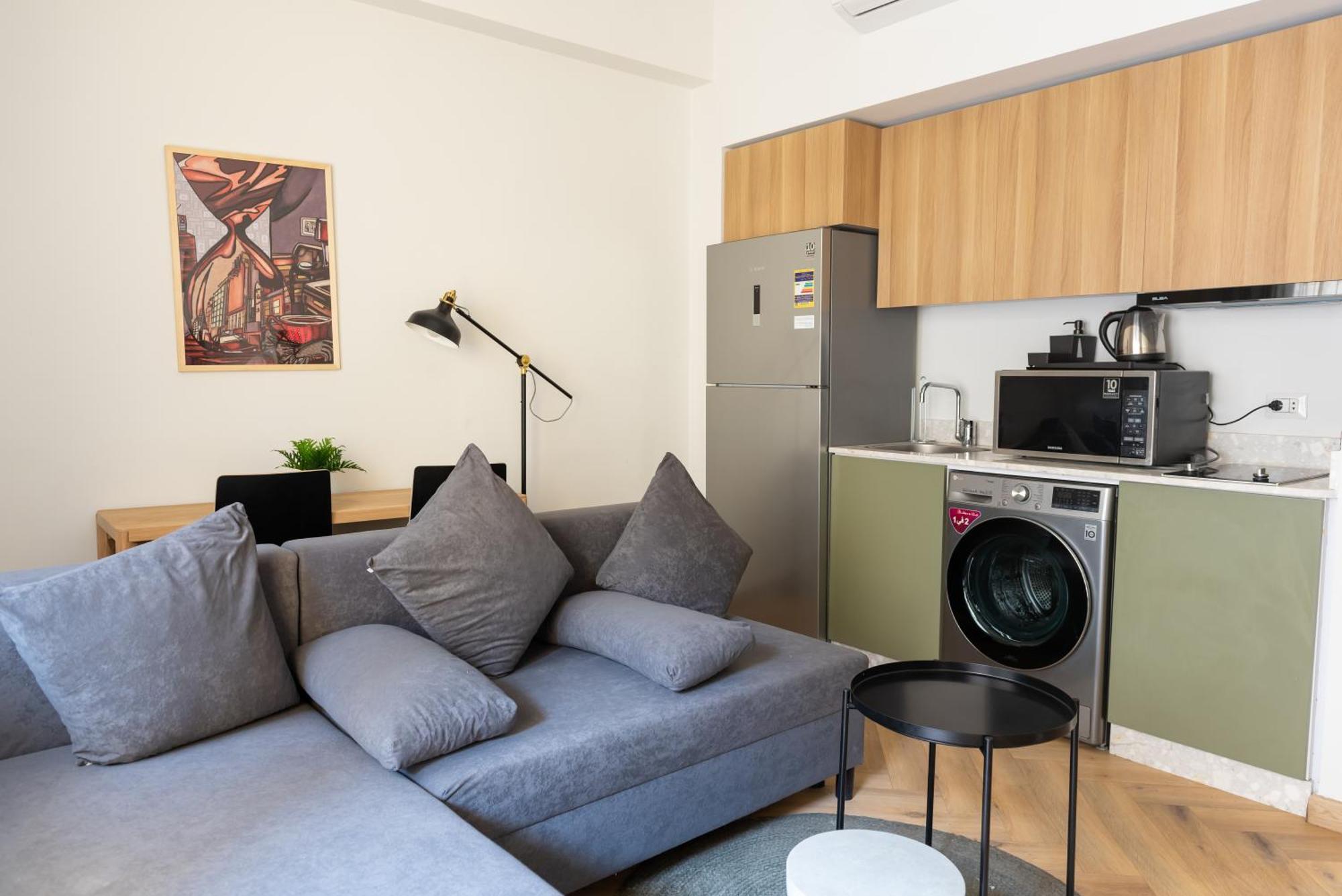 One-Bedroom Apartment with Balcony and City View